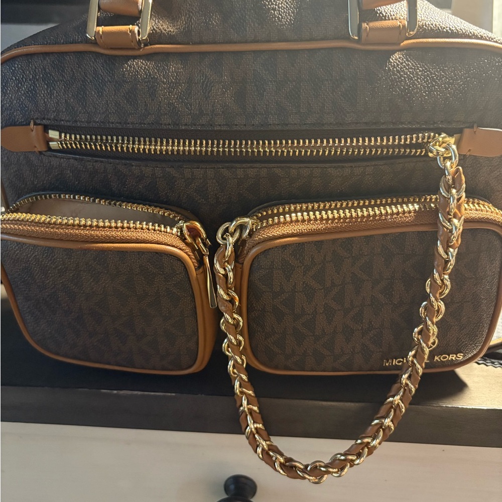 Michael KorsGently loved small camera bag 10” long x 5 1/2 inches deep x 2” wide